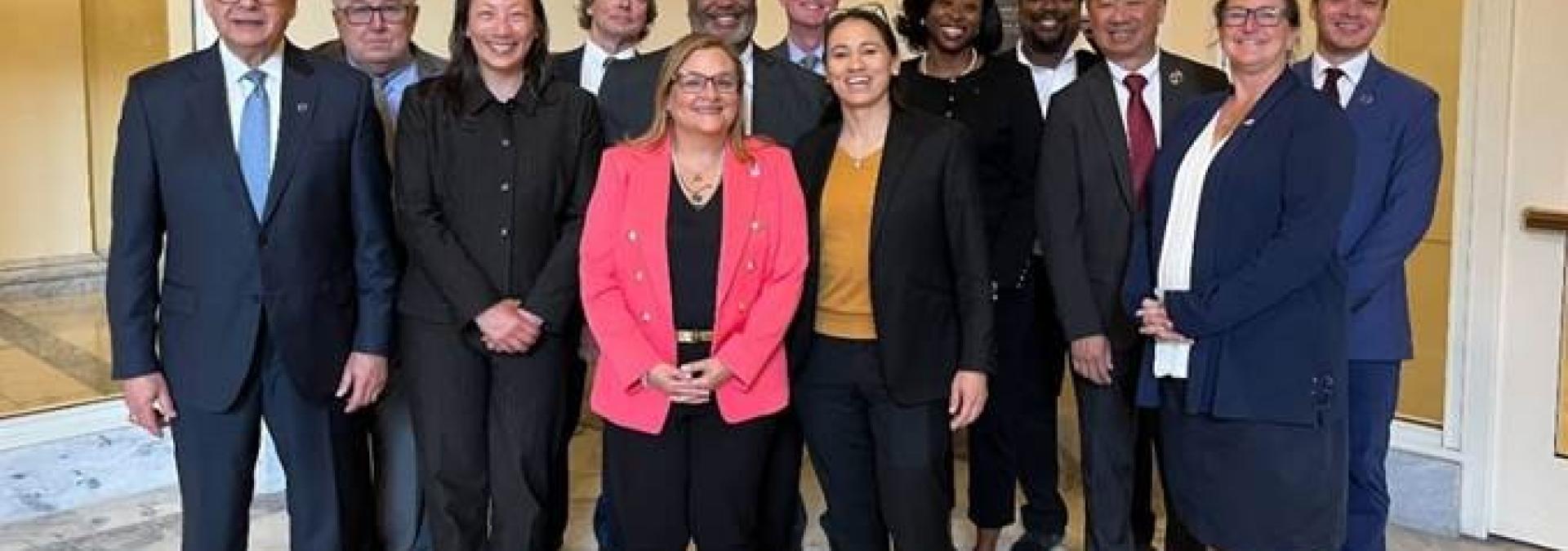 Rep. Sharice Davids with representatives from U.S. transit agencies.