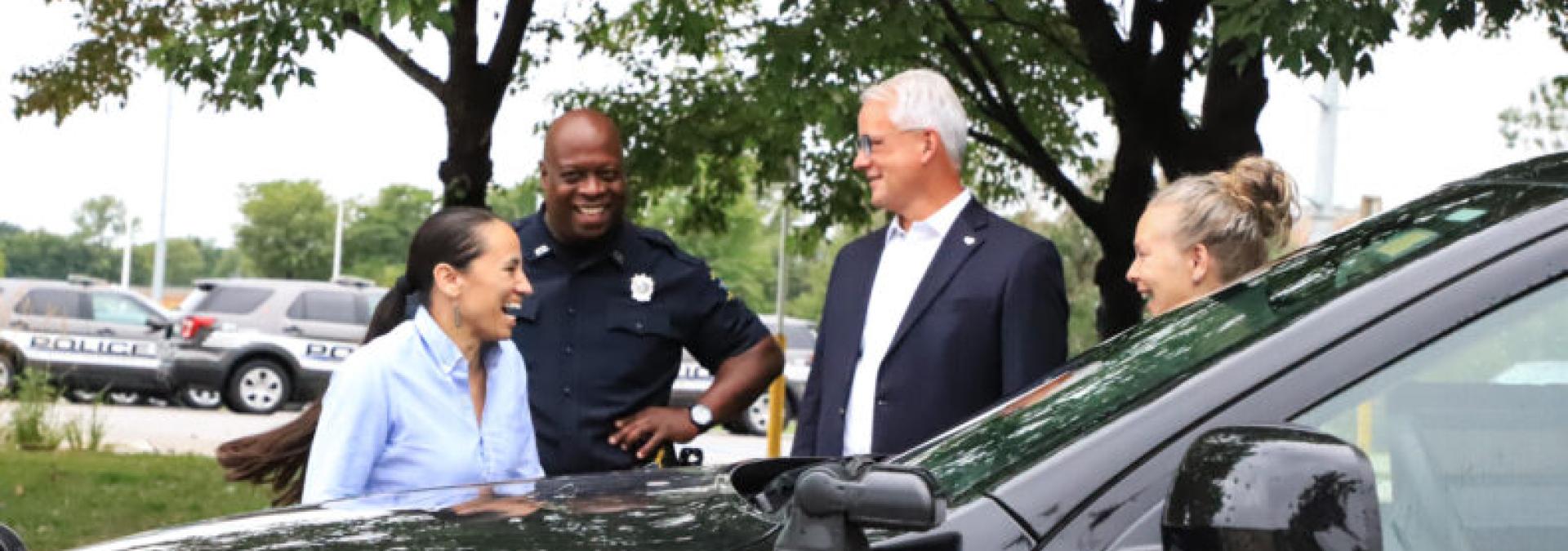 Rep. Davids (left) pictured with Officer John Lacy, Mayor Curt Skoog and Officer Tara Stevens pictured outside the Overland Park Justice Center.