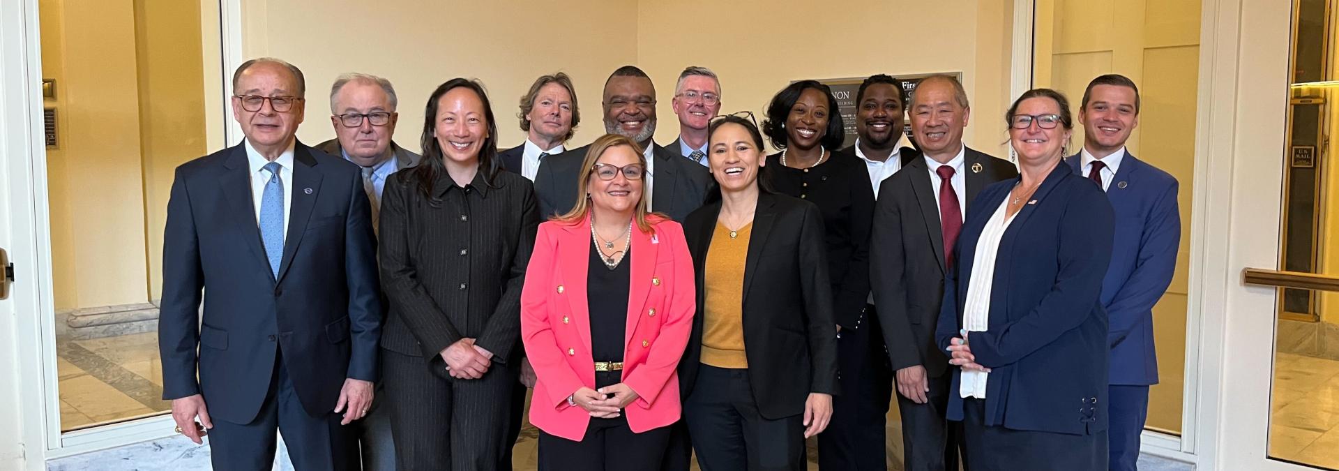 Rep. Sharice Davids with representatives from U.S. transit agencies.