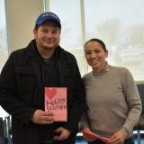 Rep. Sharice Davids with a local veteran holding a handmade valentine card