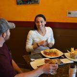 Representative Sharice Davids eating lunch at The Wooden Spoon.