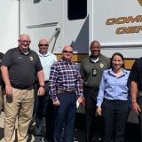 Rep. Davids with law enforcement officers at Olathe's mobile command unit