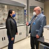 Representative Sharice Davids with Dr. Stefan Bossmann at the KU Cancer Center.