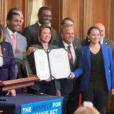 Rep. Sharice Davids at the signing of the bipartisan Respect for Marriage Act.