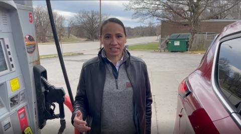 Rep. Davids at a local gas station announcing her support to suspend the federal gas tax