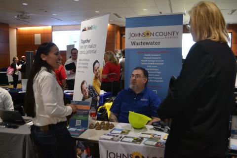 Representative Sharice Davids with Johnson County Wastewater, a business recruiting at today’s job fair.